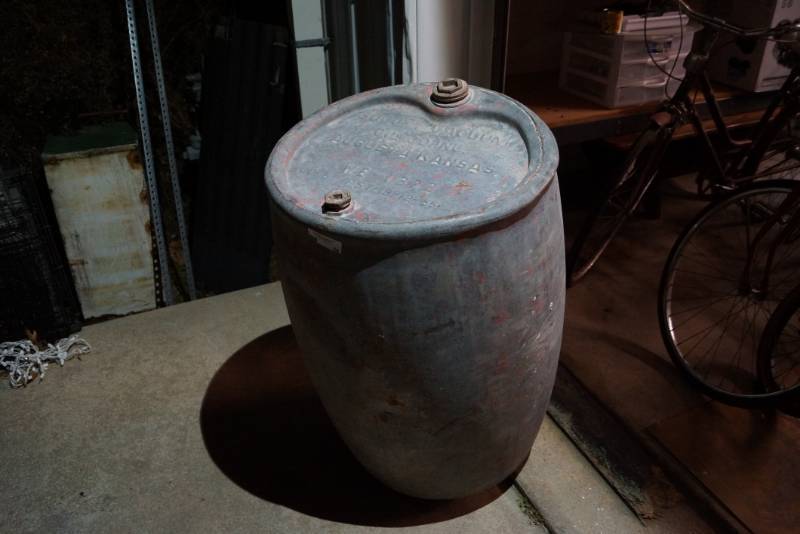 lot 50 image: Vintage 55 Gallon Oil DrumBarrel  Stamped Augusta Kansas Galvanized