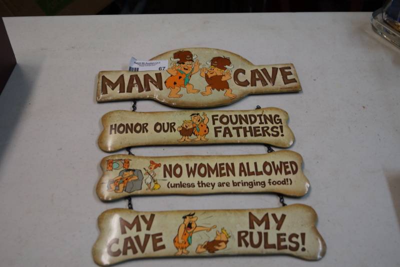 lot 67 image: Cool Metal Sign- Man Cave  Fred Flintstone  Yabba Dabba Doo