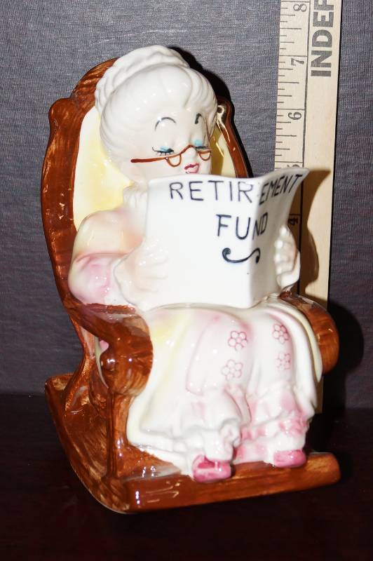 lot 610 image: Lefton #4293 Ceramic Grandma in Rocking Chair Retirement Fund Bank