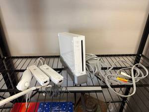 lot 804 image: Wii game console with controllers and more