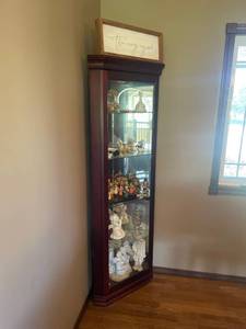 lot 912 image: Top lit beveled glass corner curio cabinet72 x 18 x 18 in