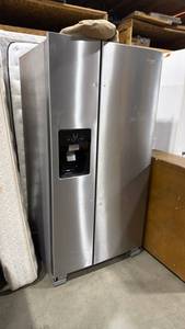 Whirlpool side by side refrigerator (handles and screws are packaged up top) 67 x 33 x 31 in