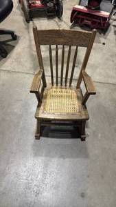 lot 966 image: Kid size rocking chair with woven seat 24 inches tall