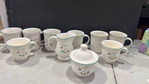 lot 1055 image: Pfaltzgraff coffee and tea cups with creamer and sugar bowl