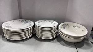 lot 1067 image: Pfaltzgraff plates and serving bowls chip on one plate