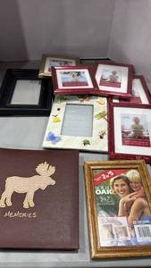 lot 1104 image: Picture frames and photo album