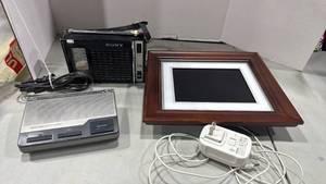 lot 1105 image: Kodak, easy shared digital frame, Sony radio and weather radio