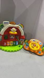 lot 1155 image: VTech Spin Around Learning Town Educational Toy and turn and learn toy