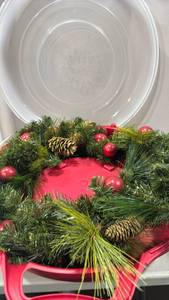 lot 1194 image: Greenery with pinecones and ornaments in wreath storage