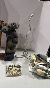 lot 1198 image: Moose paper towel holder been repaired, light switch plate and more