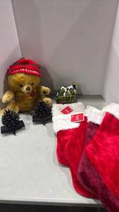 lot 1204 image: Christmas Decorations Bundle -Stockings, stocking hangers and more