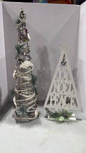 lot 1212 image: Holiday Decorative Tree Set with Joy Noel Peace Sign tallest is 24 inches
