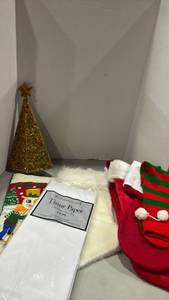 lot 1229 image: Decorative light up tree, stockings and tissue paper