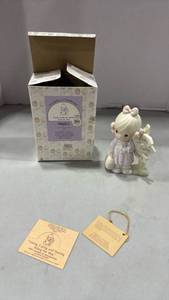 lot 1238 image: 1993 Precious Moments Charter Member Figurine - Loving Caring Sharing