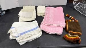 lot 1403 image: Decorative pillow case, crochet baby blanket and hat