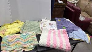 lot 1404 image: Crochet baby blankets and baby blankets some stains and tear