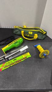lot 1443 image: Mister Twister electric fisherman appears new and Target Guard mason chisel with hand guard