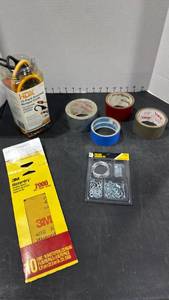 lot 1444 image: Bungee cords, picture hanging kit, tape and sanding sheets
