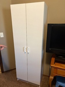 lot 918 image: White 2 door cabinet68 x 24 x 16 in