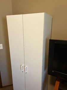lot 919 image: White 2 door cabinet68 x 24 x 16 in