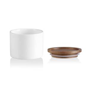 lot 16366 image: Kitchen Canisters Ceramic Food Storage Jar, Stackable Containers with Airtight Seal Wooden Lid for Serving Ground Coffee, Tea, Sugar, Spice and More - 5 Fl Oz(White Acacia) - Retail $10