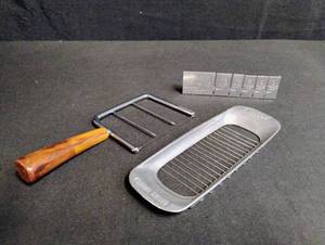 lot 1008 image: Metal Food Slicer with Wooden Handle