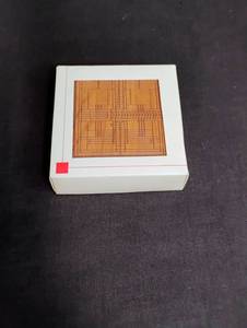 lot 1114 image: Frank Lloyd Wright Collection Wooden Coasters Set