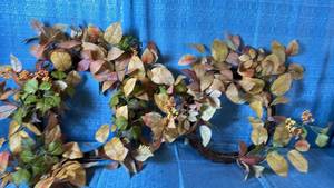 lot 2076 image: A Pair of Threshold 24 Faux Mixed Berry Fall Leaves Wreaths.