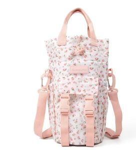lot 2444 image: Blogilates Water Bottle Sling - Cream Floral - Retail $18