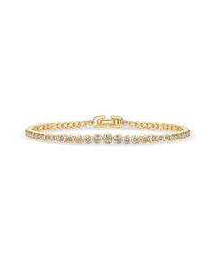 lot 2509 image: PAVOI 14K Yellow Gold Plated Graduated Simulated Diamonds Bezel Set Tennis Bracelets for Women - Cubic Zirconia Stones Round Statement Bride Gold Bracelet Stack - Size 7 - Retail $21