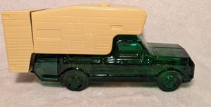 lot 1002 image: Avon The Camper Deep Woods After Shave Bottle