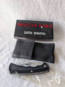 lot 1507 image: Deluxe Folding Knife with Nylon Sheath