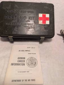 lot 5038 image: 1980s Military First Aid Kit with Air Force Manual