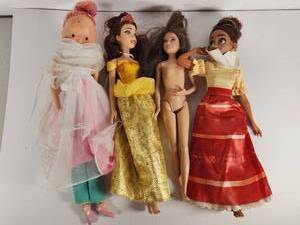 lot 122 image: Lot of Four Dolls