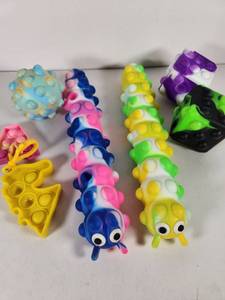 lot 255 image: Pop It Fidget Toy Collection - Caterpillar Design & More