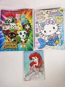 lot 263 image: Animal Crossing and Hello Kitty Coloring Books Plus Little Mermaid Notepad