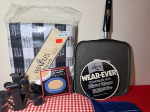lot 24 image: Table Cloth, Frying Pan, Coasters, Cast Iron Napkin Holder, Placemats