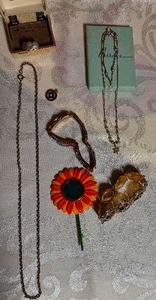lot 37 image: Jewelry - Child-Sized NecklaceBracelet, Bull Fighter, Picture Frame Pendant and More