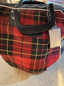 lot 82 image: Brunswick Bowling Ball w Plaid Bag