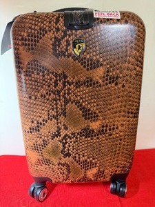 lot 133 image: Heys Snake-Print Rolling Luggage, New in Package