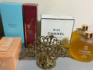 lot 148 image: Vintage ColognesPerfumesPowderLotion and Metal Decor
