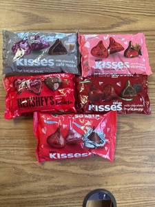 lot 3393 image: Lots of five bags of Hershey kisses in different flavors