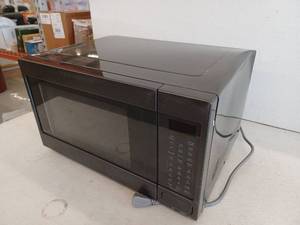 lot 10866 image: Cafe 1.5 Cu. Ft. Smart Countertop ConvectionMicrowave Oven, CCWK15C1WDS, Retail $1,119.00