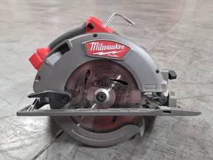 lot 9671 image: Milwaukee M18 FUEL Circular Saw 7-14 inch Cordless Power Tool  Model 2731-20