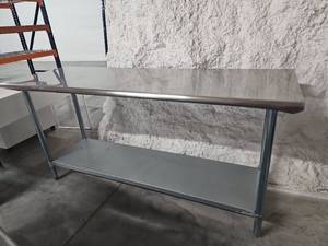 lot 9763 image: Gridmann Commercial Stainless Steel Work Table NSF
