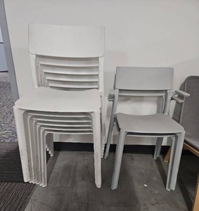 lot 9765 image: White Stackable Plastic Chairs Set