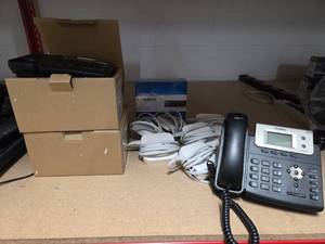 lot 9792 image: Office Equipment Bundle with Yealink IP Phones, Linksys Network Switch and Apple Airport Express Bases
