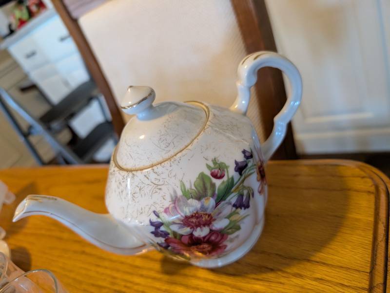 lot 2613 image: Floral Decorated Newport Fine China Teapot