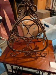 lot 202 image: Wrought Iron Wine Rack with Decorative Scrollwork
