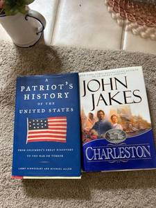 lot 4399 image: A Patriots History of the United States and John Jakes Charleston Book Set